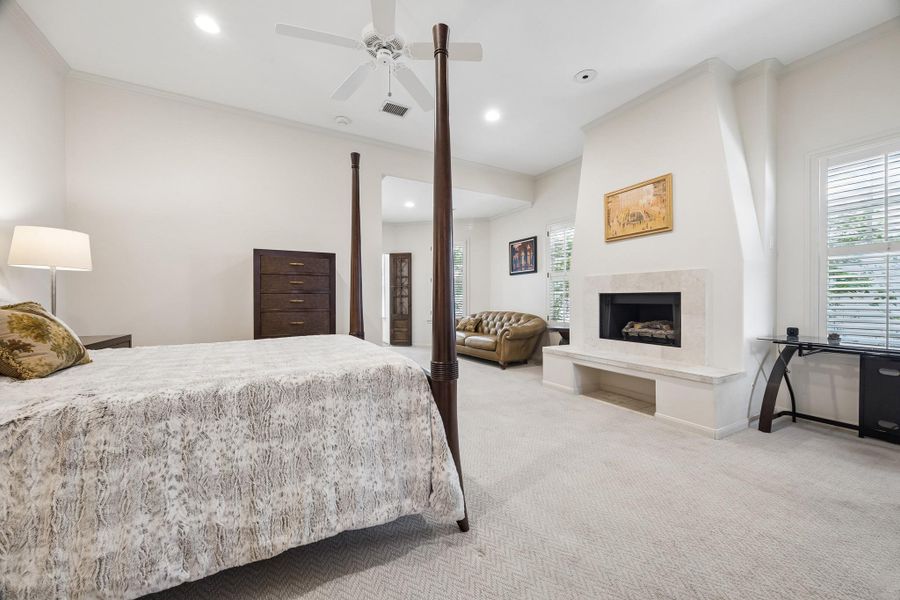 Over-sized primary bedroom .... with Fireplace !...and covered out-door patio !!!