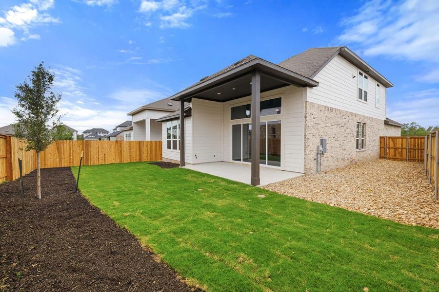 Exterior details and patio area of a home in Heritage, Dripping Springs (Image 23).