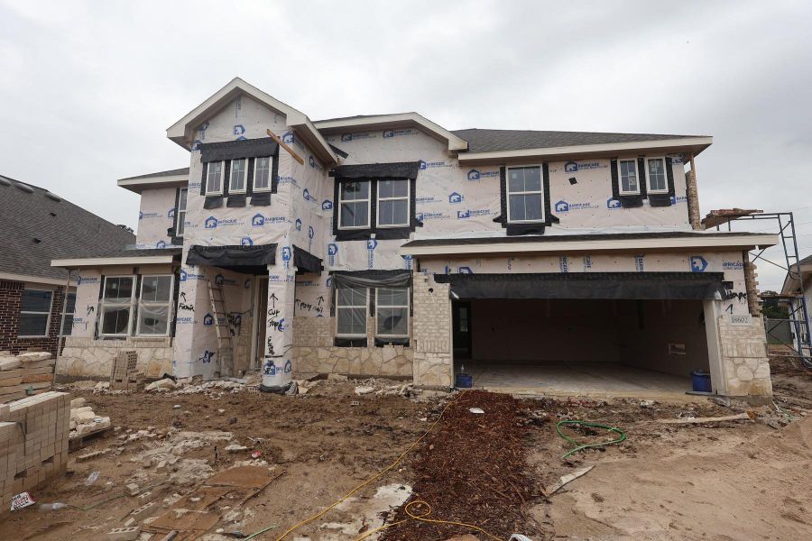 Two story home with 4 beds, 3.5 baths, and 2 car garage