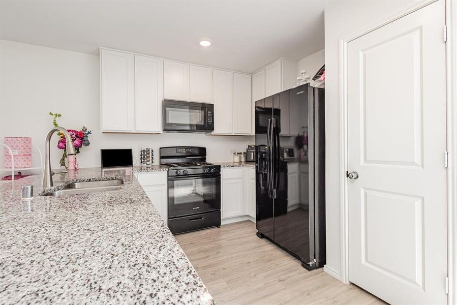 Furnished interior view inside a new home in Walden Pond: Cottage East, Forney (Image 5).