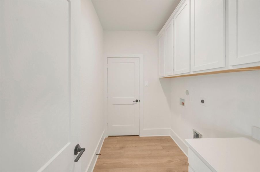 Spacious, unfurnished interior of a new home in The Oaks on 6th Street, Magnolia (Image 23).