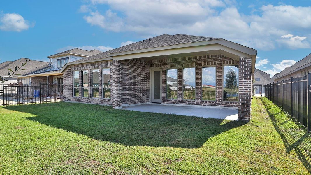 Exterior details and patio area of a home in Marvida 55' - Gated, Cypress (Image 3).