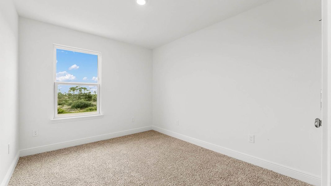 Spacious, unfurnished interior of a new home in Chateau Nemours, Port Saint Joe (Image 22).