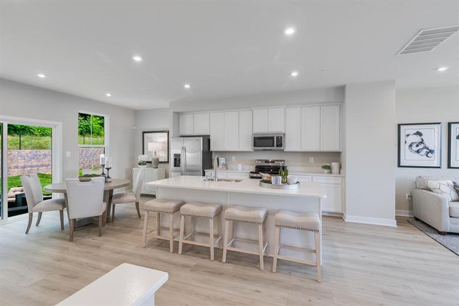 Representative furnished interior of a home built from the Overture by Ryan Homes in Moore Farm Townhomes, Indian Trail (Image 6).