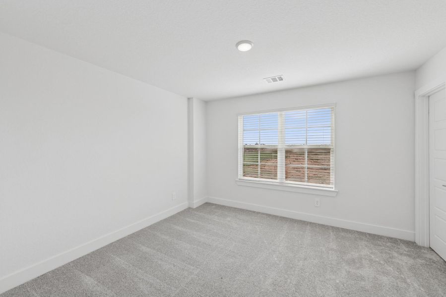 Spacious, unfurnished interior of a new home in Sorella, Tomball (Image 20).