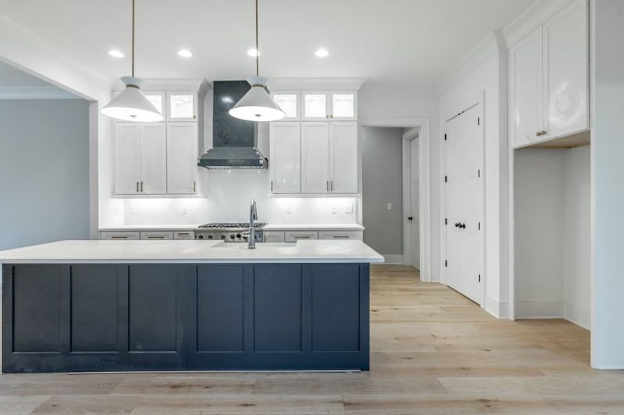 Representative furnished interior of a home built from the Carolina A by Riverstone Construction, LLC in Jasper Highlands, Guild (Image 11).