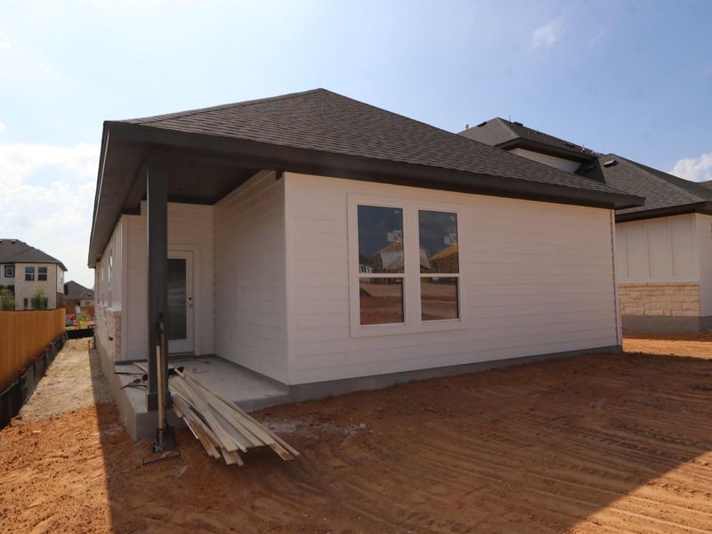 Exterior details and patio area of a home in Heritage, Dripping Springs (Image 3). Exterior details and patio area of a home in Heritage, Dripping Springs (Image 3).