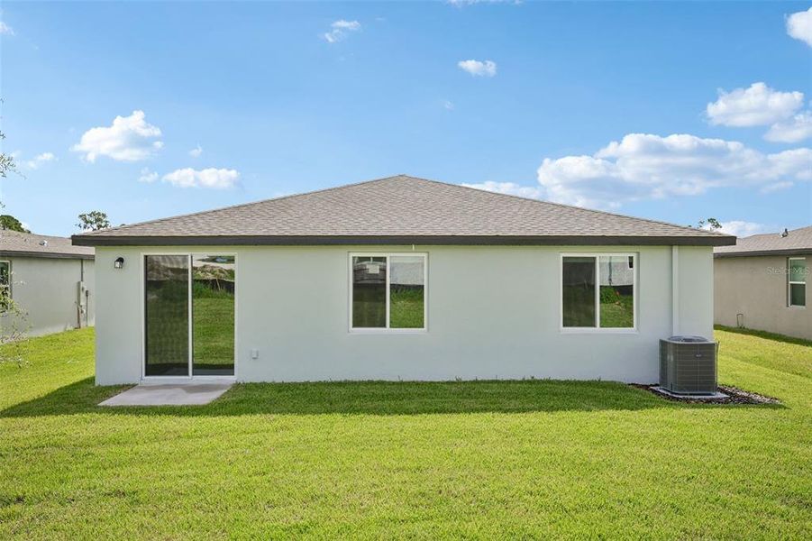 Exterior details and patio area of a home in The Reserve at Van Oaks, Auburndale (Image 3).