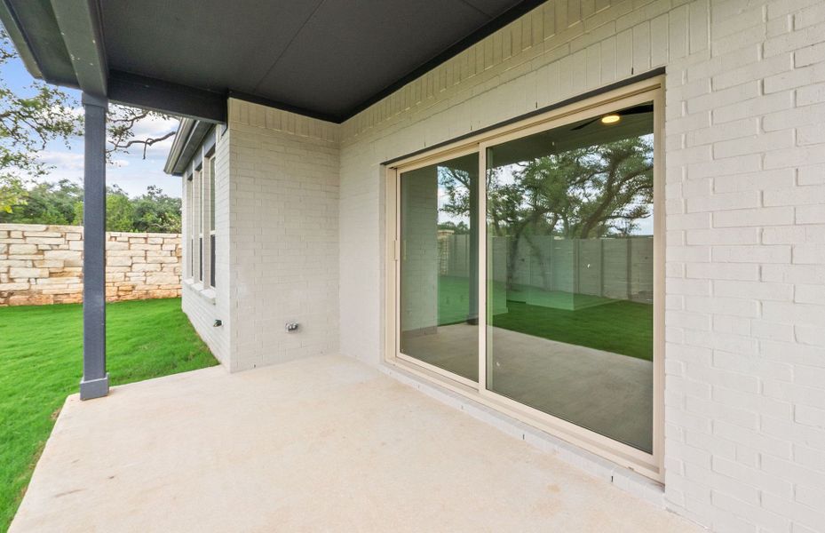 Exterior details and patio area of a home in Wolf Ranch, Georgetown (Image 4).