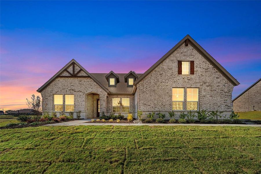 Front exterior of a new home in Creekview Addition, Van Alstyne, TX, highlighting curb appeal (Image 1).
