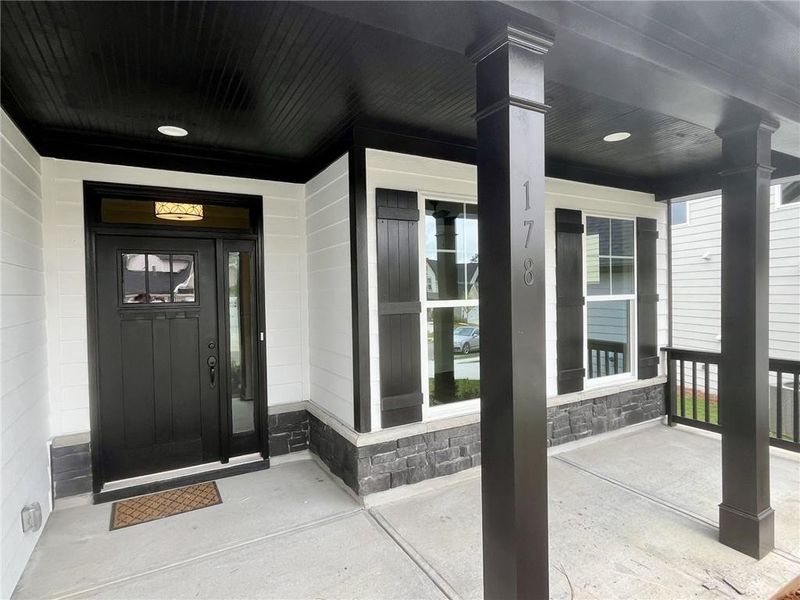 Exterior details and patio area of a home in Twin Lakes, Hoschton (Image 2).