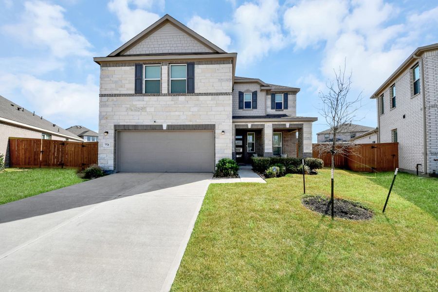 Front exterior of a new home in , Cypress, TX, highlighting curb appeal (Image 20).