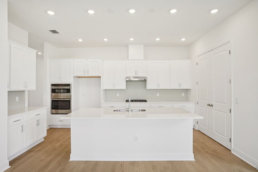 Representative furnished interior of a home built from the Siesta II by Ashton Woods in Ardisia Park, New Smyrna Beach (Image 5).