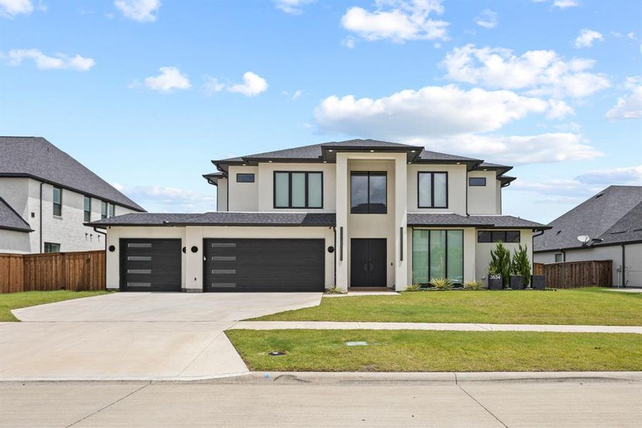 Front exterior of a new home in , Frisco, TX, highlighting curb appeal (Image 1). Front exterior of a new home in , Frisco, TX, highlighting curb appeal (Image 1).