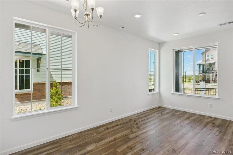 Spacious, unfurnished interior of a new home in Pacific Collection at The Townes at Skyline Ridge, Castle Pines (Image 17).