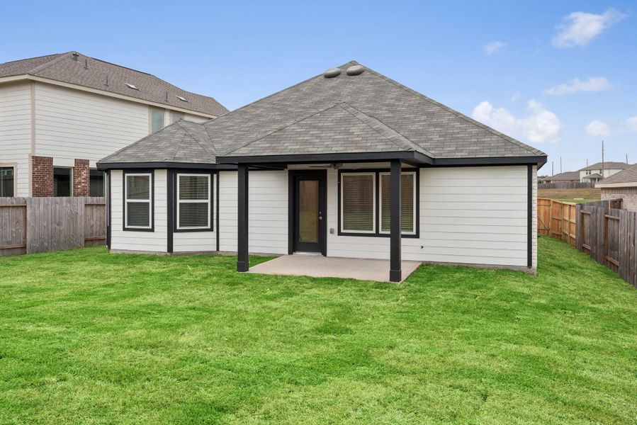 Exterior details and patio area of a home in Magnolia Ridge, Magnolia (Image 3).
