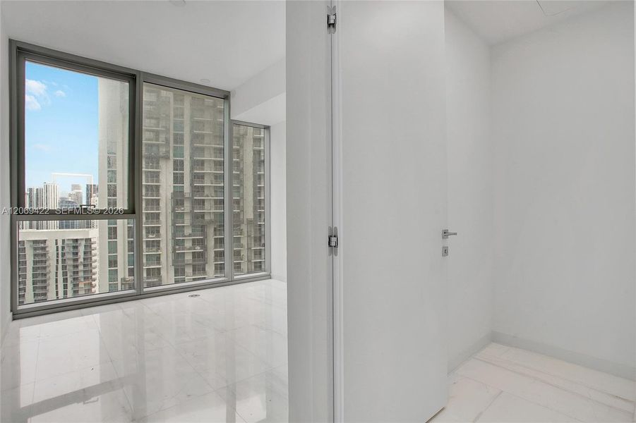 Spacious, unfurnished interior of a new home in Aston Martin Residences, Miami (Image 10). Spacious, unfurnished interior of a new home in Aston Martin Residences, Miami (Image 10).