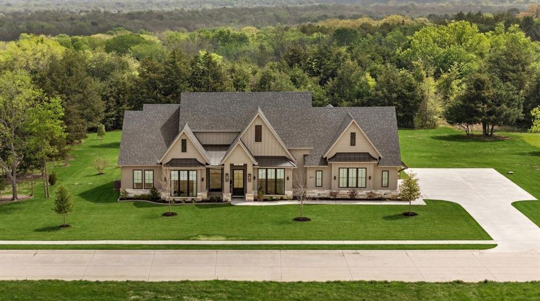 Front exterior of a new home in , Caddo Mills, TX, highlighting curb appeal (Image 1). Front exterior of a new home in , Caddo Mills, TX, highlighting curb appeal (Image 1).