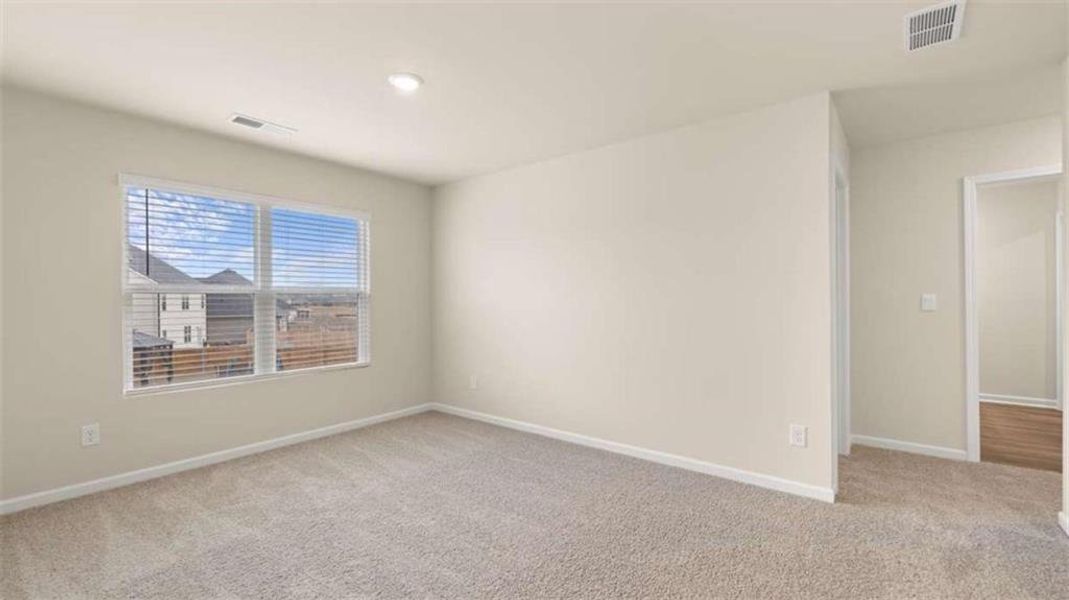 Spacious, unfurnished interior of a new home in The Preserve at Agricultural Village, Perry (Image 17).