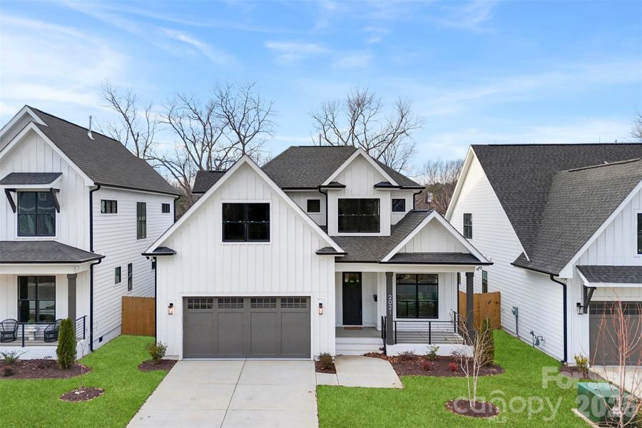 Front exterior of a new home in , Charlotte, NC, highlighting curb appeal (Image 26).