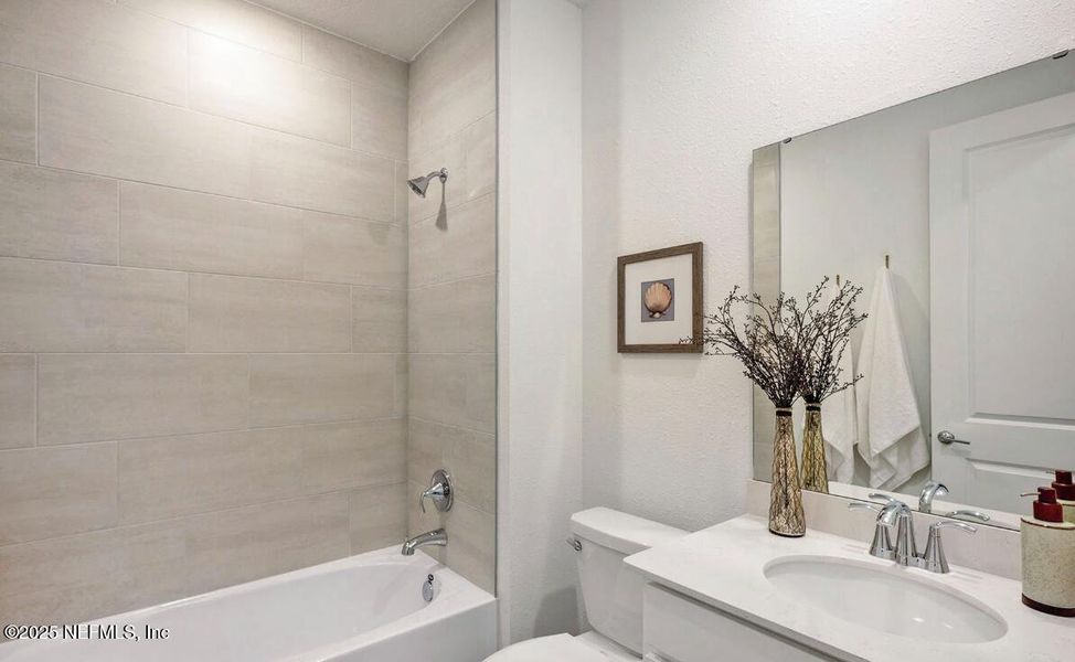 Furnished interior view inside a new home in Edenbrooke at Hyland Trail | 55+: Edenbrooke at Hyland Trail 60s, Green Cove Springs (Image 12).