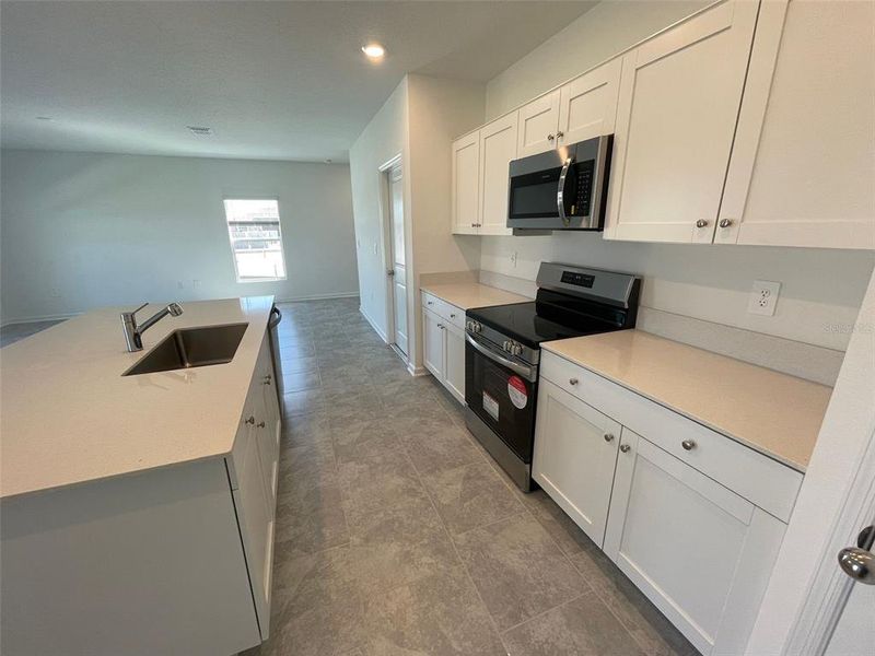 Furnished interior view inside a new home in Lawson Dunes, Haines City (Image 4).