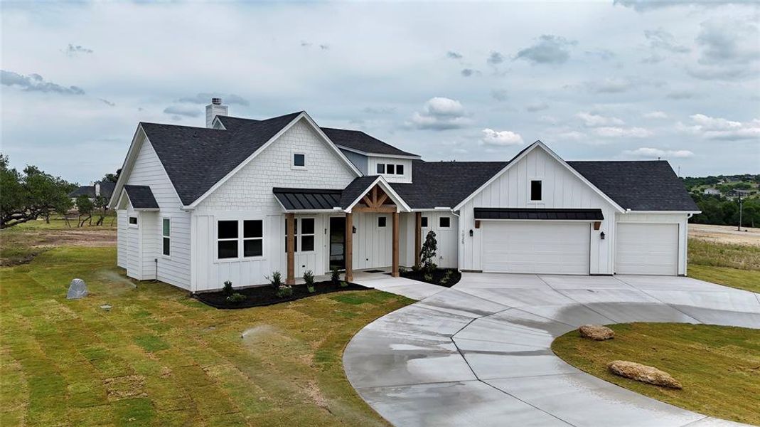 Front exterior of a new home in , Weatherford, TX, highlighting curb appeal (Image 23).