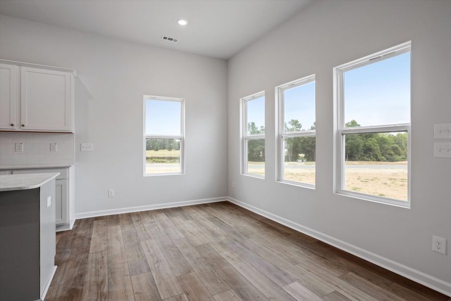 Spacious, unfurnished interior of a new home in Cambridge Reserve, Angier (Image 20).