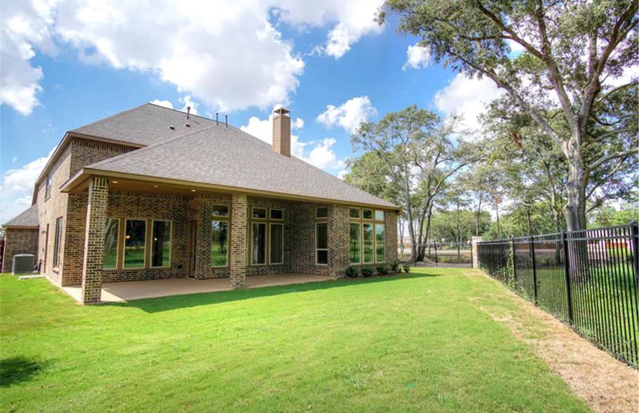 Representative exterior details of a home built from the 4198 by Ravenna Homes in The Woodlands Hills 65′, Willis (Image 18).