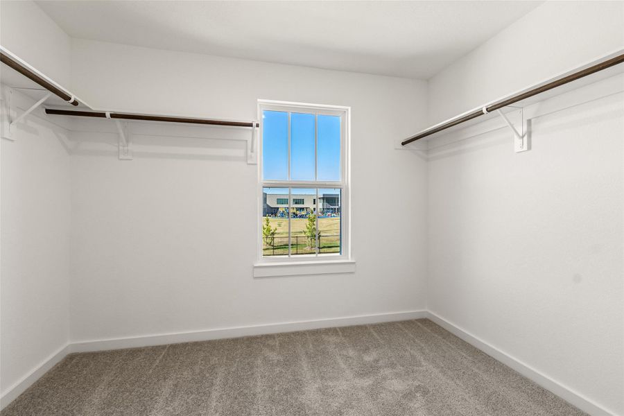 Spacious, unfurnished interior of a new home in Sunterra, Katy (Image 39).