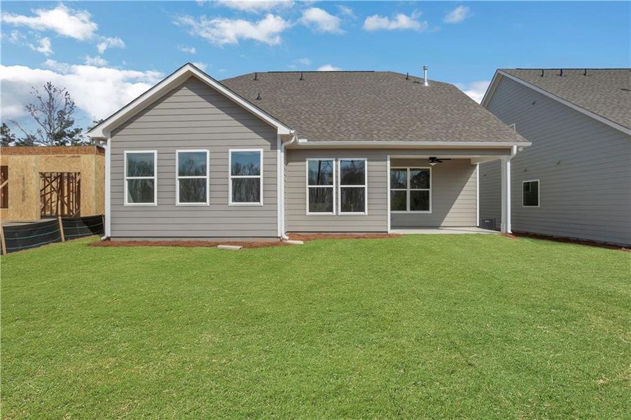 Exterior details and patio area of a home in Marble Tree, Ball Ground (Image 24).