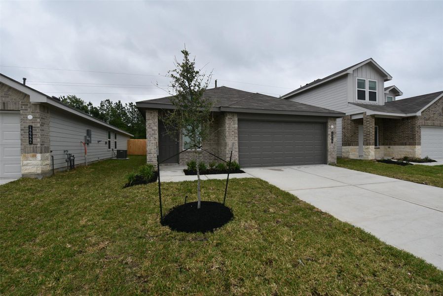 Front exterior of a new home in , Houston, TX, highlighting curb appeal (Image 25). Front exterior of a new home in , Houston, TX, highlighting curb appeal (Image 25).