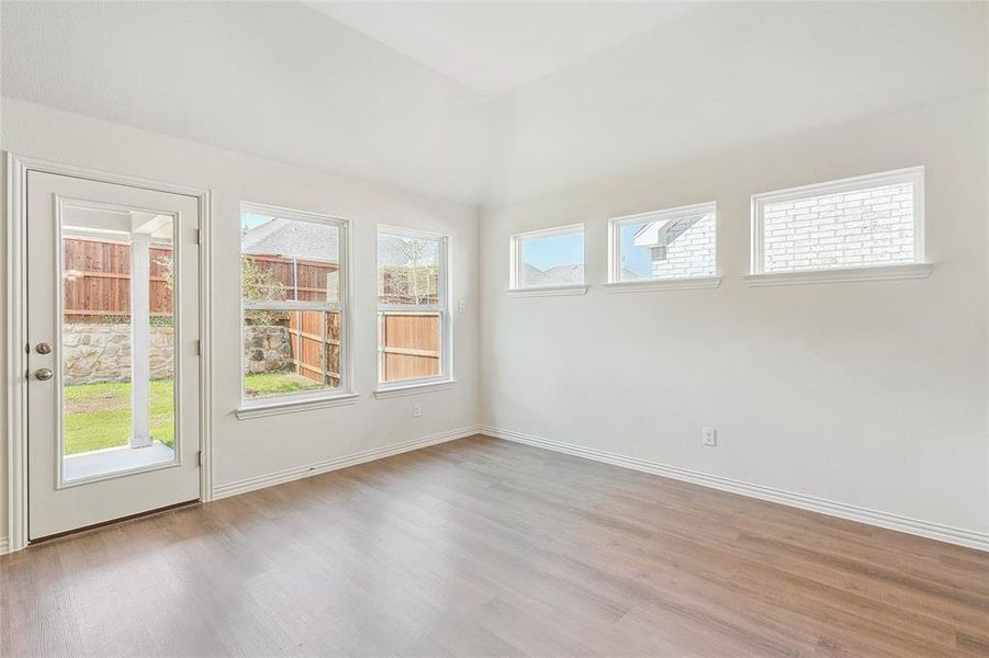 Empty room with light wood-type flooring