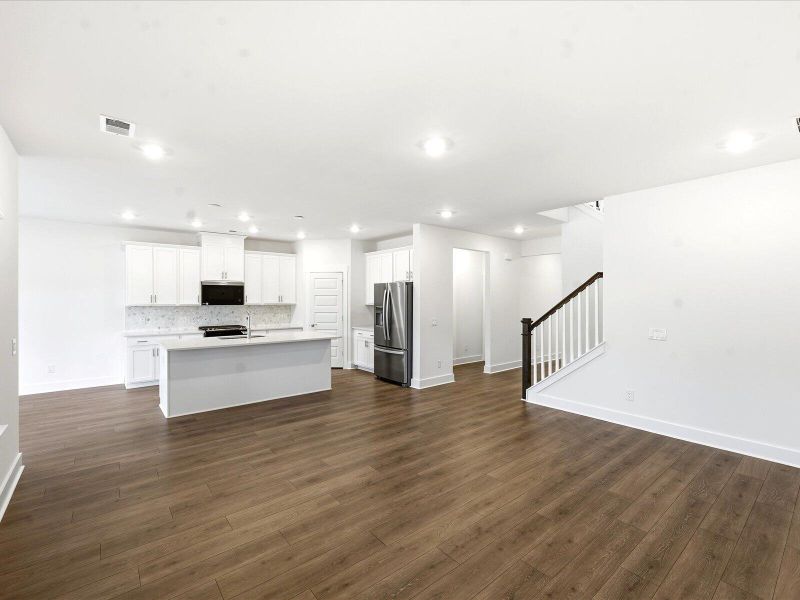 Spacious, unfurnished interior of a new home in The Coves at Lakes of Cane Bay II, Summerville (Image 38).
