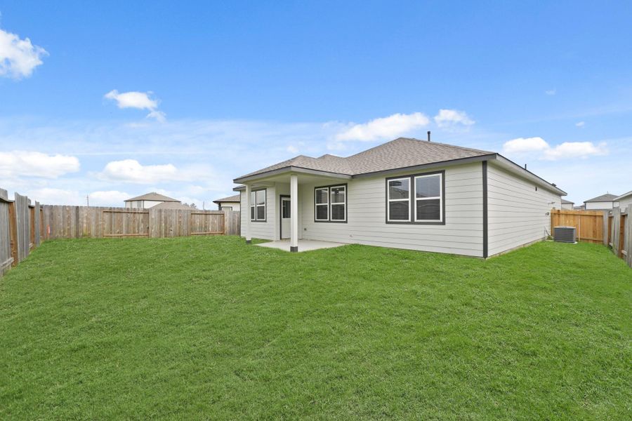 Exterior details and patio area of a home in Granger Pines, Conroe (Image 3).