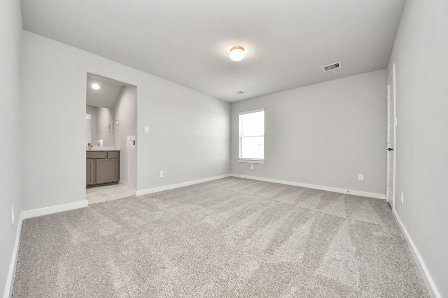 Generously sized secondary bedrooms featuring spacious closets, soft and inviting carpeting underfoot, large windows allowing plenty of natural light, and the added touch of privacy blinds for your personal retreat. Sample photo of completed home with similar floor plan. Actual colors and selections may vary. Generously sized secondary bedrooms featuring spacious closets, soft and inviting carpeting underfoot, large windows allowing plenty of natural light, and the added touch of privacy blinds for your personal retreat. Sample photo of completed home with similar floor plan. Actual colors and selections may vary.