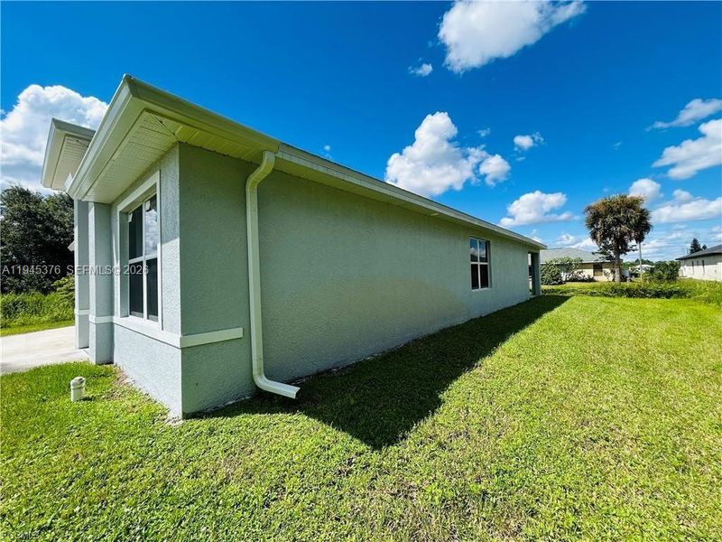 Exterior details and patio area of a home in , Lehigh Acres (Image 14). Exterior details and patio area of a home in , Lehigh Acres (Image 14).