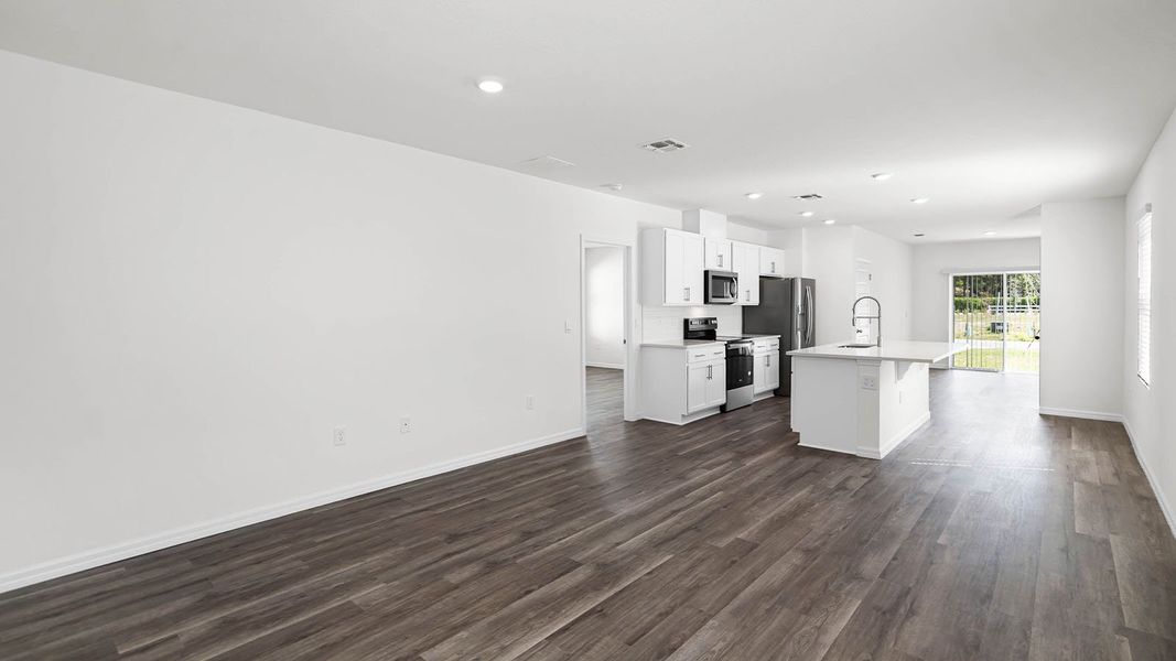 Representative unfurnished interior of a home built from the ASTOR by D.R. Horton in Harmony at Lake Eloise, Winter Haven (Image 10).