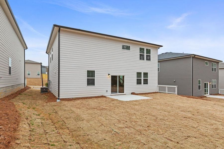 Exterior details and patio area of a home in Belleview Manor, Fairburn (Image 3).