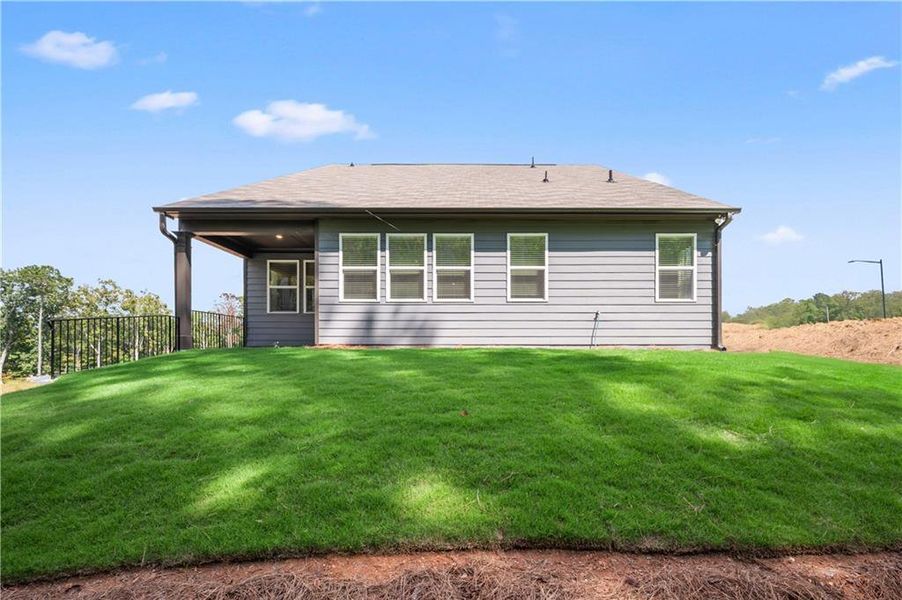Front exterior of a new home in Cambridge at Steels Bridge: Steels Bridge, Canton, GA, highlighting curb appeal (Image 17). Front exterior of a new home in Cambridge at Steels Bridge: Steels Bridge, Canton, GA, highlighting curb appeal (Image 17).