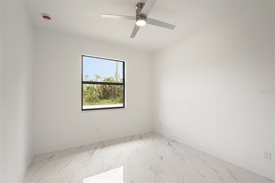 Spacious, unfurnished interior of a new home in , Port Charlotte (Image 25).