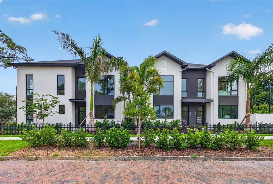 Front exterior of a new home in , St. Petersburg, FL, highlighting curb appeal (Image 22). Front exterior of a new home in , St. Petersburg, FL, highlighting curb appeal (Image 22).