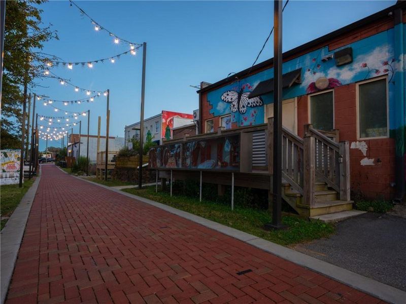 Front exterior of a new home in Stillwood, Hapeville, GA, highlighting curb appeal (Image 20).