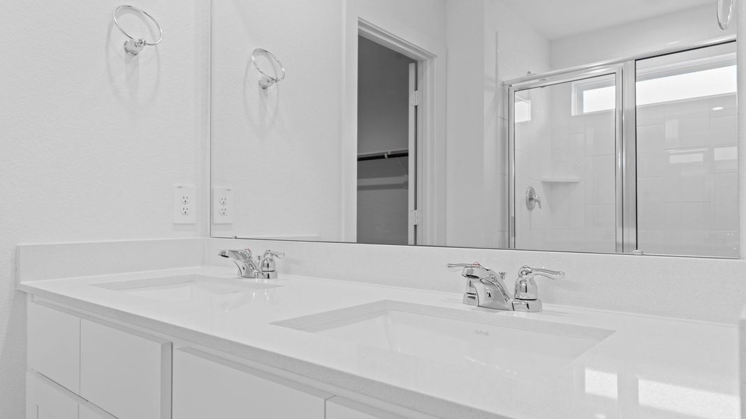 Representative furnished interior of a home built from the Caden by D.R. Horton in Caldwell Crossing, Iowa Colony (Image 10).