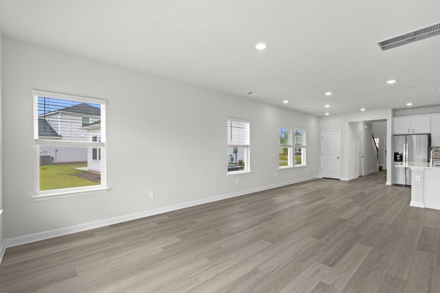 Spacious, unfurnished interior of a new home in Cypress Ridge - The Boardwalk Series, Longs (Image 18).