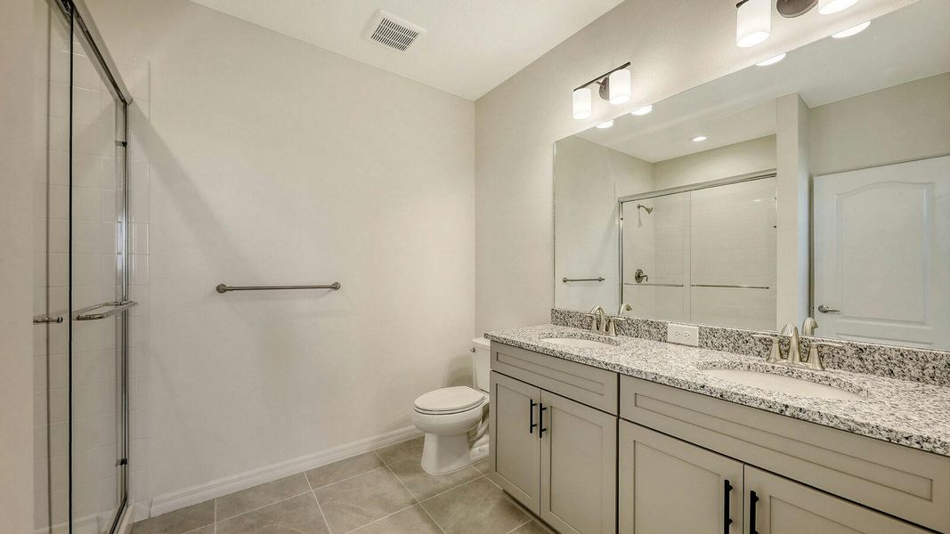 Furnished interior view inside a new home in Palm Grove Real Estate and Homes for Sale in Lakewood Ranch, FL - Neal Communities, Lakewood Ranch (Image 14).
