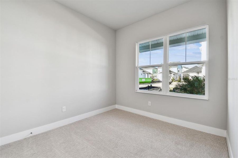 Spacious, unfurnished interior of a new home in Emerald Landing at Waterside at Lakewood Ranch – Cottage Series, Sarasota (Image 31). Spacious, unfurnished interior of a new home in Emerald Landing at Waterside at Lakewood Ranch – Cottage Series, Sarasota (Image 31).