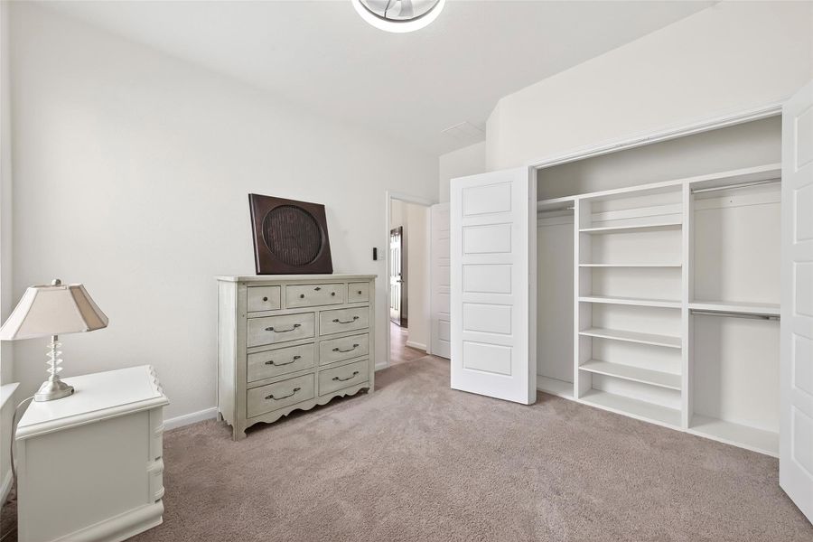 Bedroom three features built in shelving in the closet, great for storage!