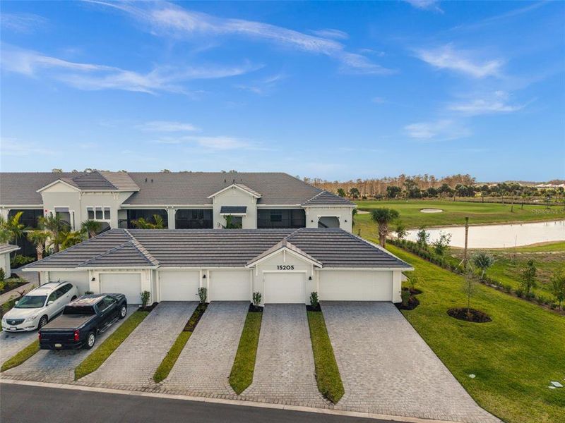 Front exterior of a new home in , Punta Gorda, FL, highlighting curb appeal (Image 2).