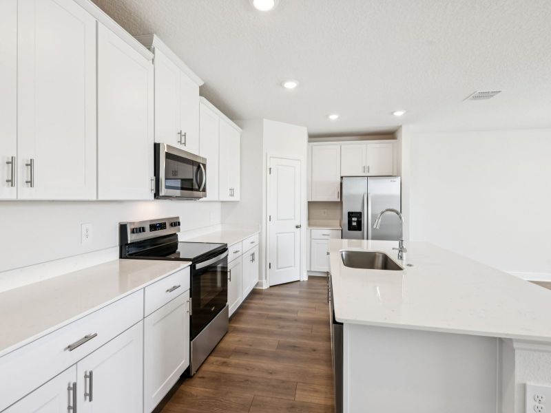 Furnished interior view inside a new home in The Reserve at Hammock Oaks - Signature Series, Lady Lake (Image 5).
